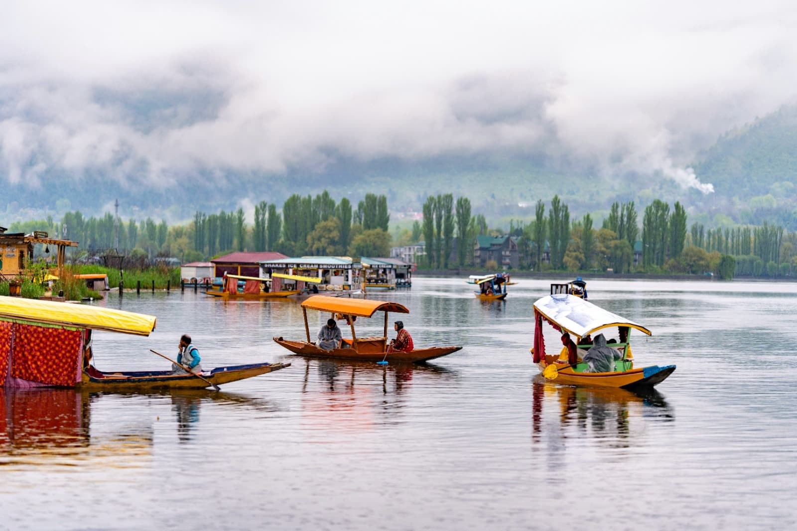 Scenic Kashmir Valley with snow peaks and serene waters